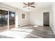 Bright room featuring sliding glass door, and vinyl floors at 2540 Thornton Dr, Atlanta, GA 30349