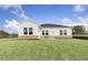 Newly sodded backyard with view of neighborhood at 630 Pineberry Ct, Grayson, GA 30017