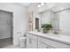 Double vanity bathroom with quartz countertops and large walk-in shower at 630 Pineberry Ct, Grayson, GA 30017