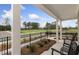 Relaxing front porch with rocking chairs and neighborhood view at 630 Pineberry Ct, Grayson, GA 30017