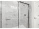 Large walk-in shower with marble tile and modern fixtures at 630 Pineberry Ct, Grayson, GA 30017