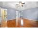 Main bedroom with hardwood floors, ceiling fan and ample natural light at 2269 Chimney Swift Cir, Marietta, GA 30062