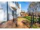 Landscaped backyard with deck and fence at 3779 Churchill Sw Dr, Marietta, GA 30064