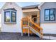 Inviting front porch with wooden railings and gray deck at 3779 Churchill Sw Dr, Marietta, GA 30064