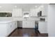 Modern kitchen with white cabinets, quartz countertops, and stainless steel appliances at 3779 Churchill Sw Dr, Marietta, GA 30064