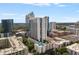 Aerial view of a modern high-rise building with a rooftop pool at 860 Peachtree Ne St # 2605, Atlanta, GA 30308
