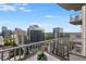 Spacious balcony with city views and seating at 860 Peachtree Ne St # 2605, Atlanta, GA 30308