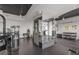 Modern gym featuring Cybex weight machines and free weights at 860 Peachtree Ne St # 2605, Atlanta, GA 30308