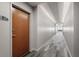 Building hallway with modern flooring and lighting at 860 Peachtree Ne St # 2605, Atlanta, GA 30308