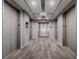 Modern building hallway with elevators and carpet at 860 Peachtree Ne St # 2605, Atlanta, GA 30308