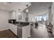 Open concept kitchen with stainless steel appliances and dark countertops at 860 Peachtree Ne St # 2605, Atlanta, GA 30308