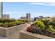 Landscaped rooftop terrace with city views at 860 Peachtree Ne St # 2605, Atlanta, GA 30308