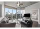 Modern living room with city views and comfortable seating at 860 Peachtree Ne St # 2605, Atlanta, GA 30308