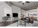 Open concept living room with city views and modern furnishings at 860 Peachtree Ne St # 2605, Atlanta, GA 30308