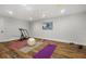 Basement gym with exercise equipment and yoga mats at 4152 Club Dr, Atlanta, GA 30319