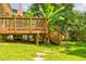 Large wooden deck with stairs leading to the backyard at 1576 Temple Ave, Atlanta, GA 30337