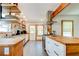 Modern kitchen with butcher block countertops and stainless steel appliances at 1576 Temple Ave, Atlanta, GA 30337