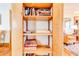 Built-in shelving unit filled with various books and items at 1576 Temple Ave, Atlanta, GA 30337
