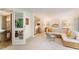 Finished basement with a sectional sofa and a staircase leading upstairs at 1020 W Wesley Nw Rd, Atlanta, GA 30327