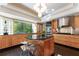 Modern kitchen with stainless steel appliances and wood cabinetry at 1020 W Wesley Nw Rd, Atlanta, GA 30327