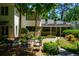 Charming patio with seating area, surrounded by lush greenery at 1020 W Wesley Nw Rd, Atlanta, GA 30327