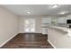 Dining area with dark hardwood floors and access to a back deck at 3446 Newberry Trl, Decatur, GA 30034