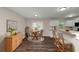 Bright eat-in kitchen with granite counters, stainless steel appliances, and dining area at 3446 Newberry Trl, Decatur, GA 30034