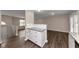 Open concept kitchen and living room with hardwood floors at 3446 Newberry Trl, Decatur, GA 30034
