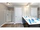 Bathroom with double vanity and shower at 3457 Sardis Bend Dr, Buford, GA 30519