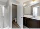Bathroom with shower, toilet, and double vanity at 3457 Sardis Bend Dr, Buford, GA 30519