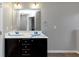 Bathroom with double vanity and large mirror at 3457 Sardis Bend Dr, Buford, GA 30519