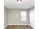 Spacious bedroom with neutral walls and wood-look flooring at 3457 Sardis Bend Dr, Buford, GA 30519