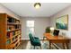 Charming home office with built-in shelves and a workspace at 3457 Sardis Bend Dr, Buford, GA 30519