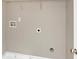 Laundry room with built-in shelving and hookups for washer and dryer at 3457 Sardis Bend Dr, Buford, GA 30519