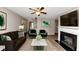 Living room with fireplace, hardwood floors and seating area at 3457 Sardis Bend Dr, Buford, GA 30519