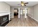 Spacious living room with hardwood floors, fireplace, and open floor plan at 3457 Sardis Bend Dr, Buford, GA 30519