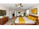 Main bedroom with mid-century modern furniture and ensuite access at 3457 Sardis Bend Dr, Buford, GA 30519