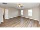 Large main bedroom with ceiling fan and ensuite bathroom access at 3457 Sardis Bend Dr, Buford, GA 30519