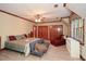 Bedroom with ensuite bathroom, two closets and furniture at 115 Russell Rd, Roswell, GA 30075