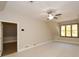 Bright and open bedroom with natural light from large windows at 115 Russell Rd, Roswell, GA 30075