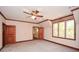 Bedroom with ensuite walk-in closet and bright window at 115 Russell Rd, Roswell, GA 30075