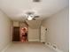 Large empty bedroom with carpeting and natural light from a window at 115 Russell Rd, Roswell, GA 30075
