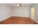 Spacious bedroom with ceiling fan and natural lighting at 115 Russell Rd, Roswell, GA 30075