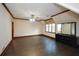 Bedroom featuring hardwood floors, dresser and bright window at 115 Russell Rd, Roswell, GA 30075
