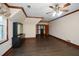 Bedroom with hardwood floors, dresser and ensuite closet at 115 Russell Rd, Roswell, GA 30075