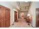 Elegant foyer featuring a staircase and hardwood floors, offering a welcoming entrance to the home at 115 Russell Rd, Roswell, GA 30075