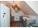 Modern kitchen with white subway tile, gray cabinets, and hardwood floors at 115 Russell Rd, Roswell, GA 30075