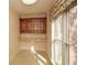 Sunny laundry room with storage cabinets, counter space, and natural light at 115 Russell Rd, Roswell, GA 30075