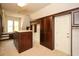 Spacious walk-in closet featuring custom wood shelving and cabinets at 115 Russell Rd, Roswell, GA 30075