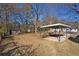 Large backyard with a covered patio and storage shed at 1761 Derrill Dr, Decatur, GA 30032